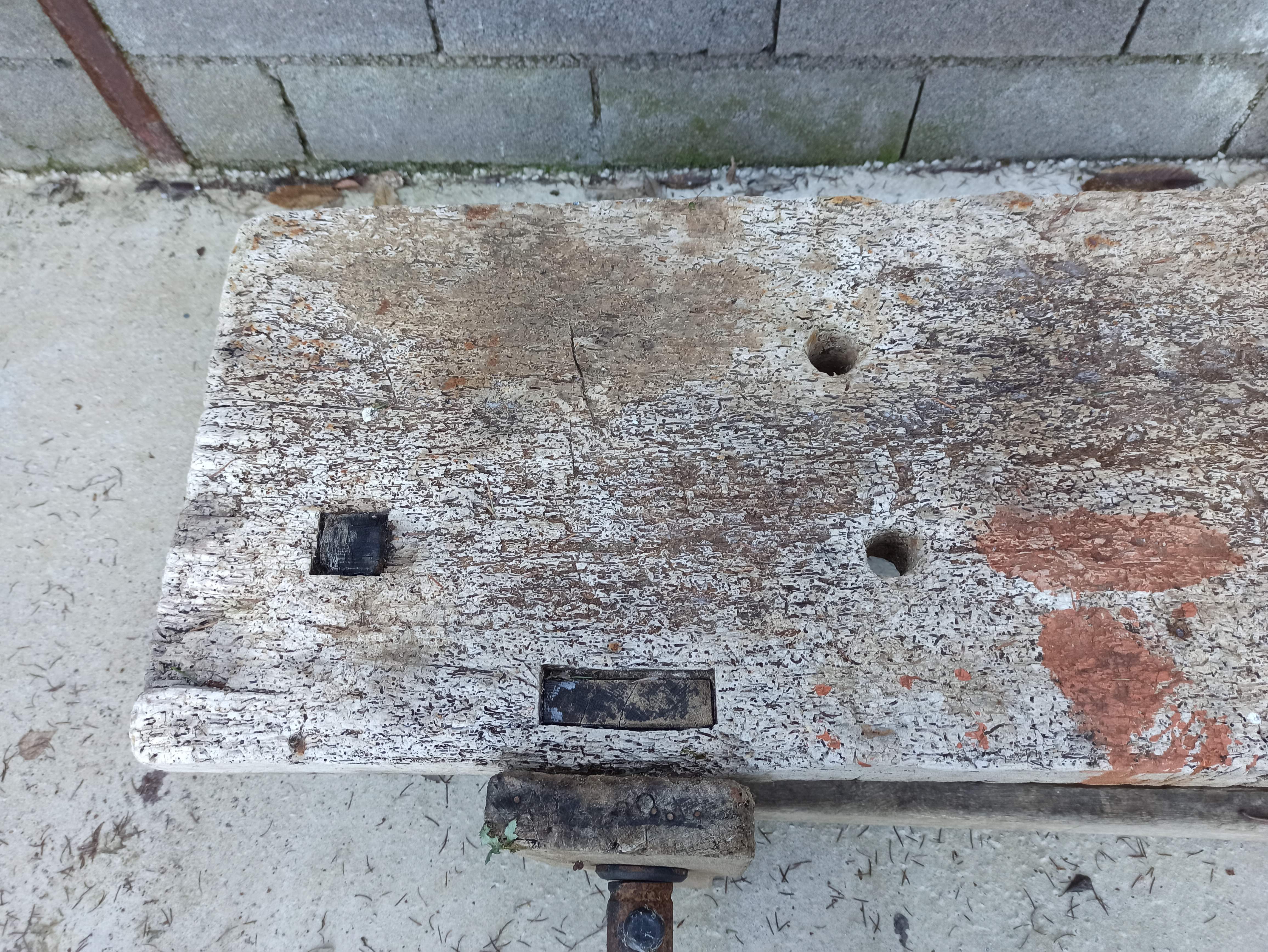 Wooden carpenter's workbench with iron and wooden vice