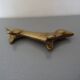 Series of 6 vintage gilded brass dachshund knife holders