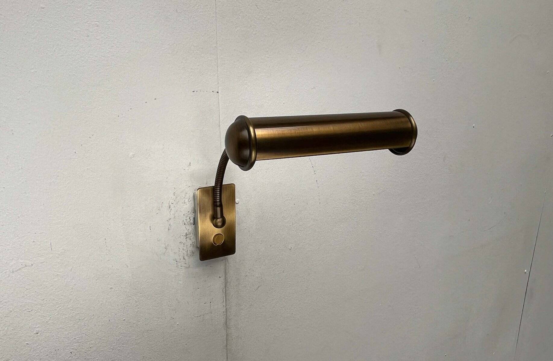 Vintage German brass patinated wall lamp with a gooseneck design by Honsel, 1970s.