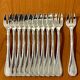 Christofle Malmaison 12 oyster forks, new condition