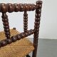 Corner chair in Arts and Crafts style made of oak with a rush seat, 1950s.