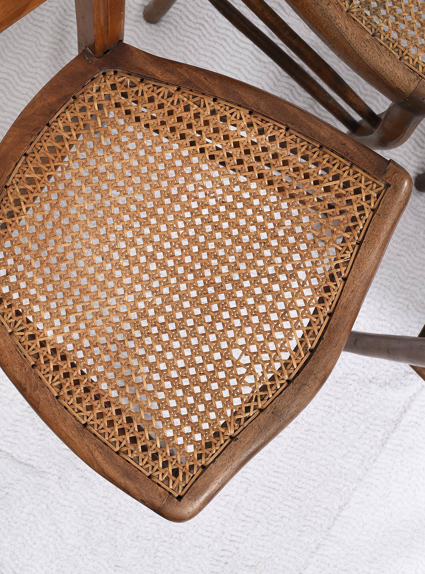 Set of 5 old cane chairs.