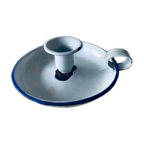 Old enamelled metal candlestick