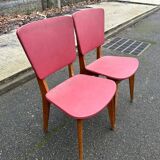 2 chaises scandinaves bois massif et cuir bordeaux 1970