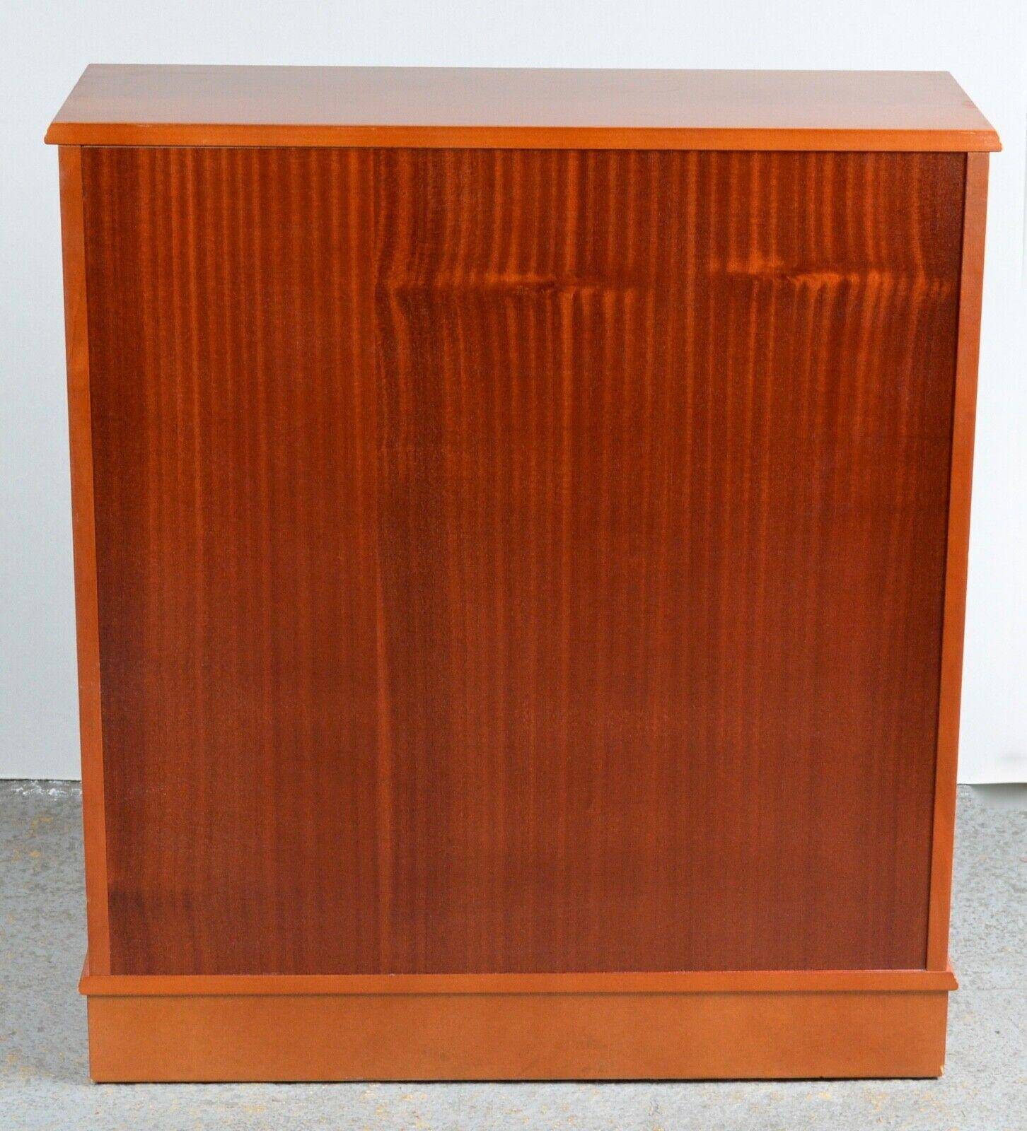Pair of light walnut bookshelves with inlays and adjustable shelves.