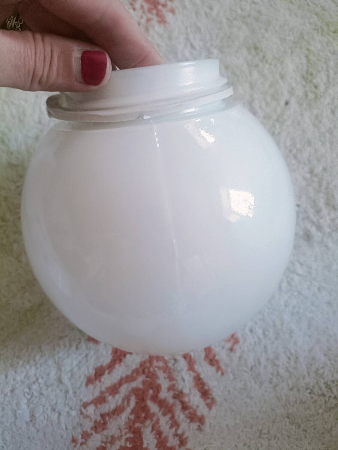 Two opaline glass globe wall lights