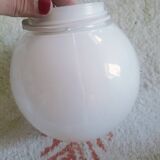 Two opaline glass globe wall lights