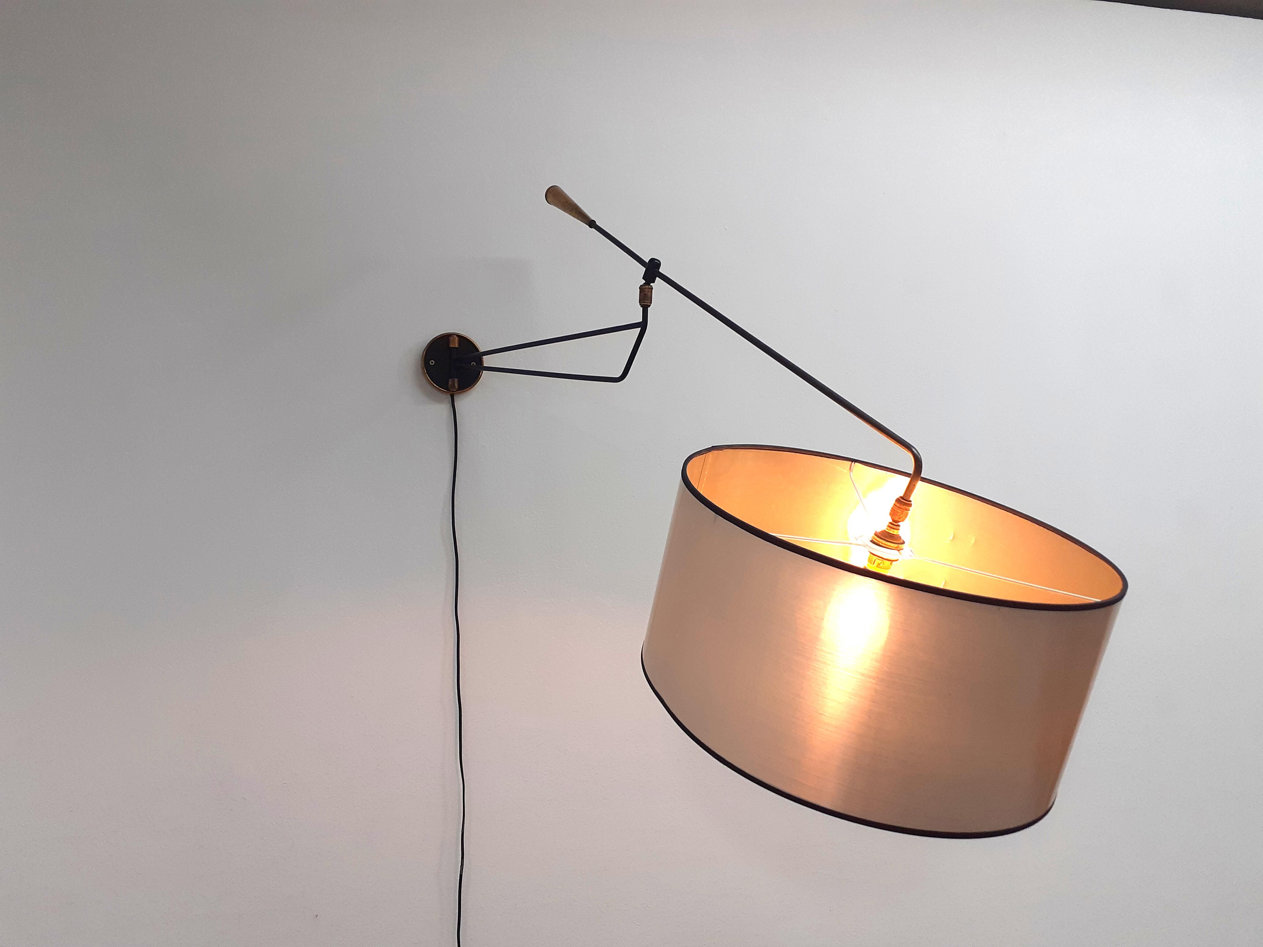 Metal and brass articulated sconce edited by Lunel, 1950s