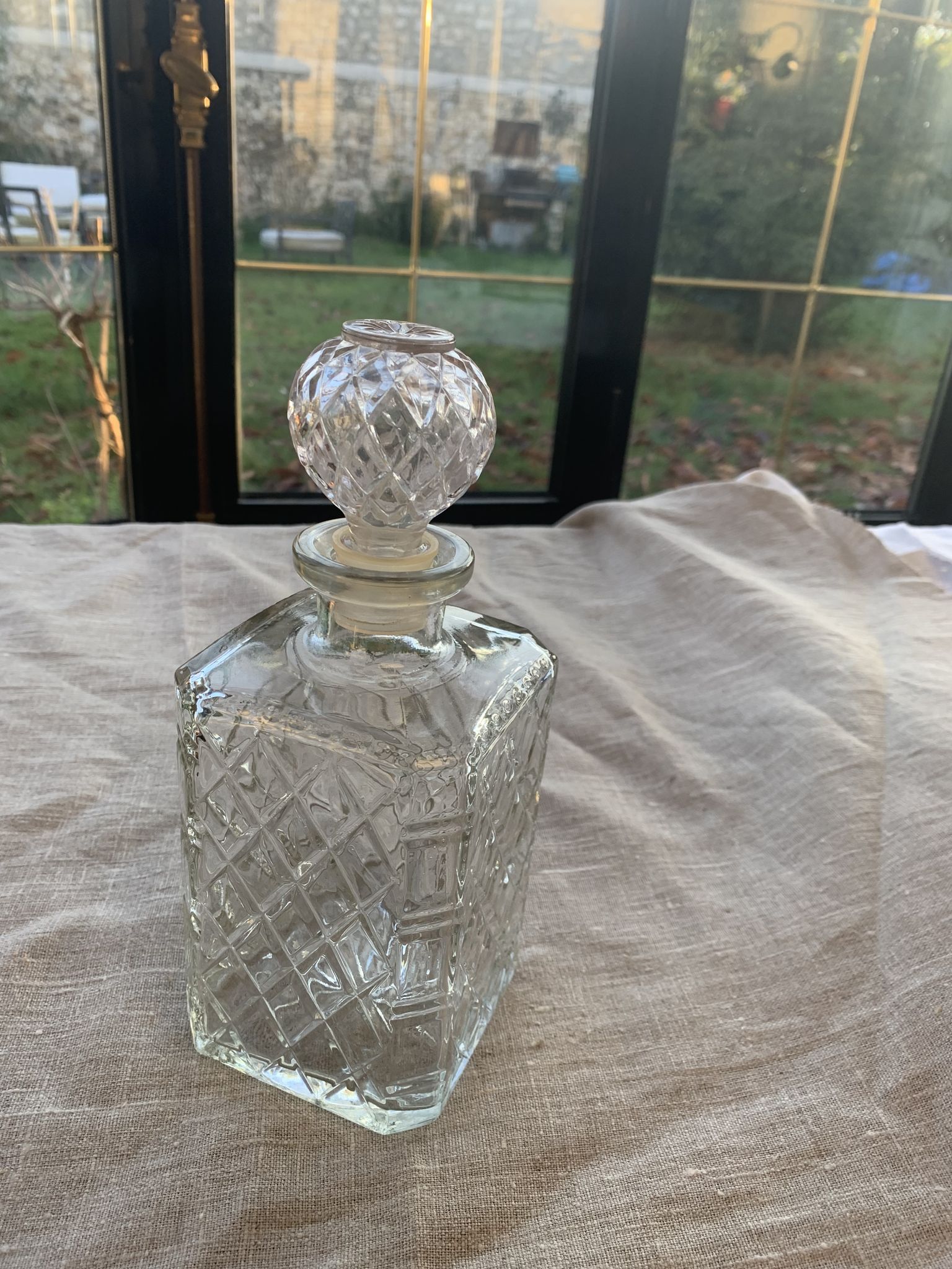 Vintage transparent molded glass whisky decanter