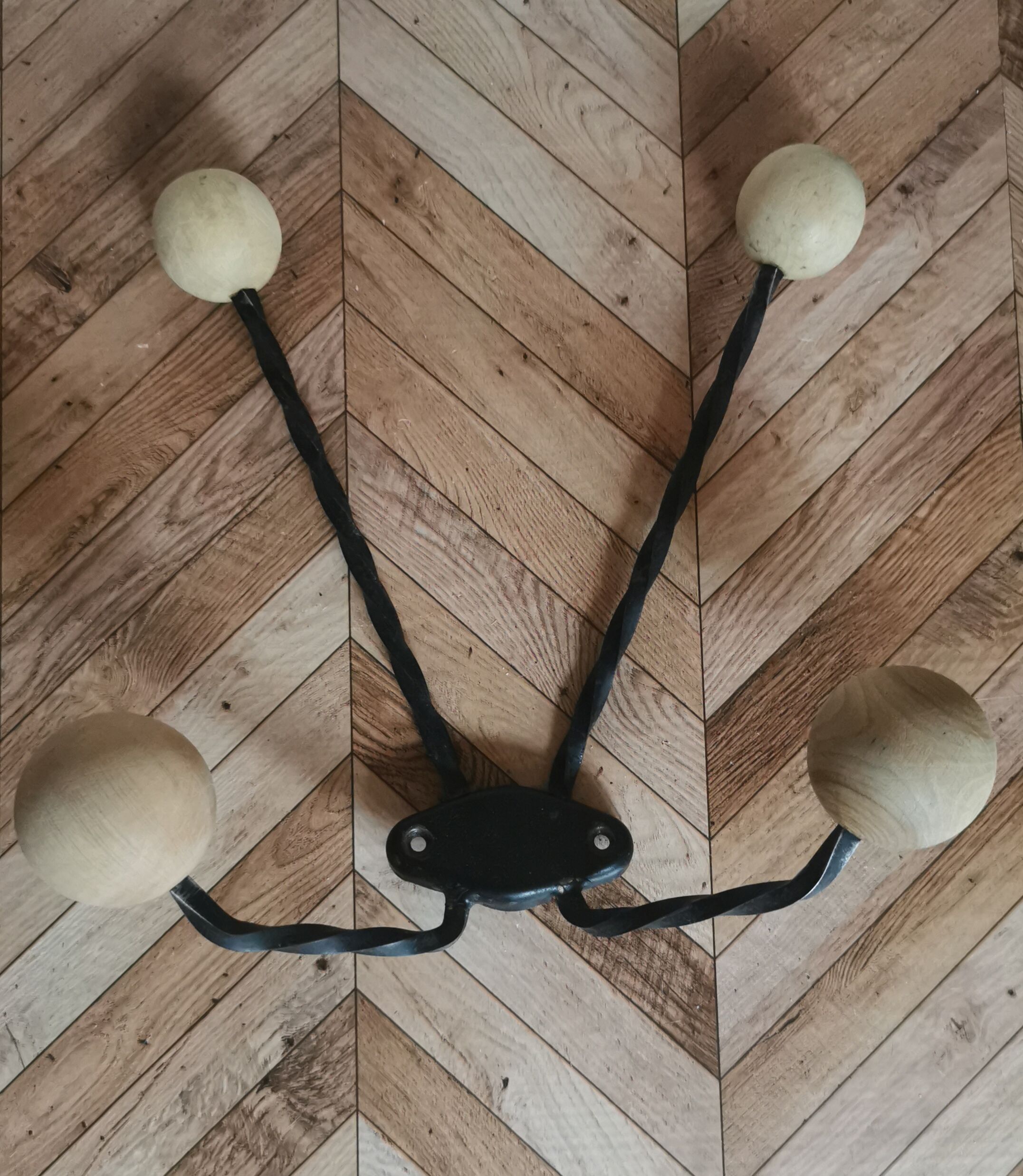 Wooden and iron wall coat holder