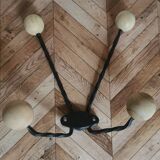 Wooden and iron wall coat holder