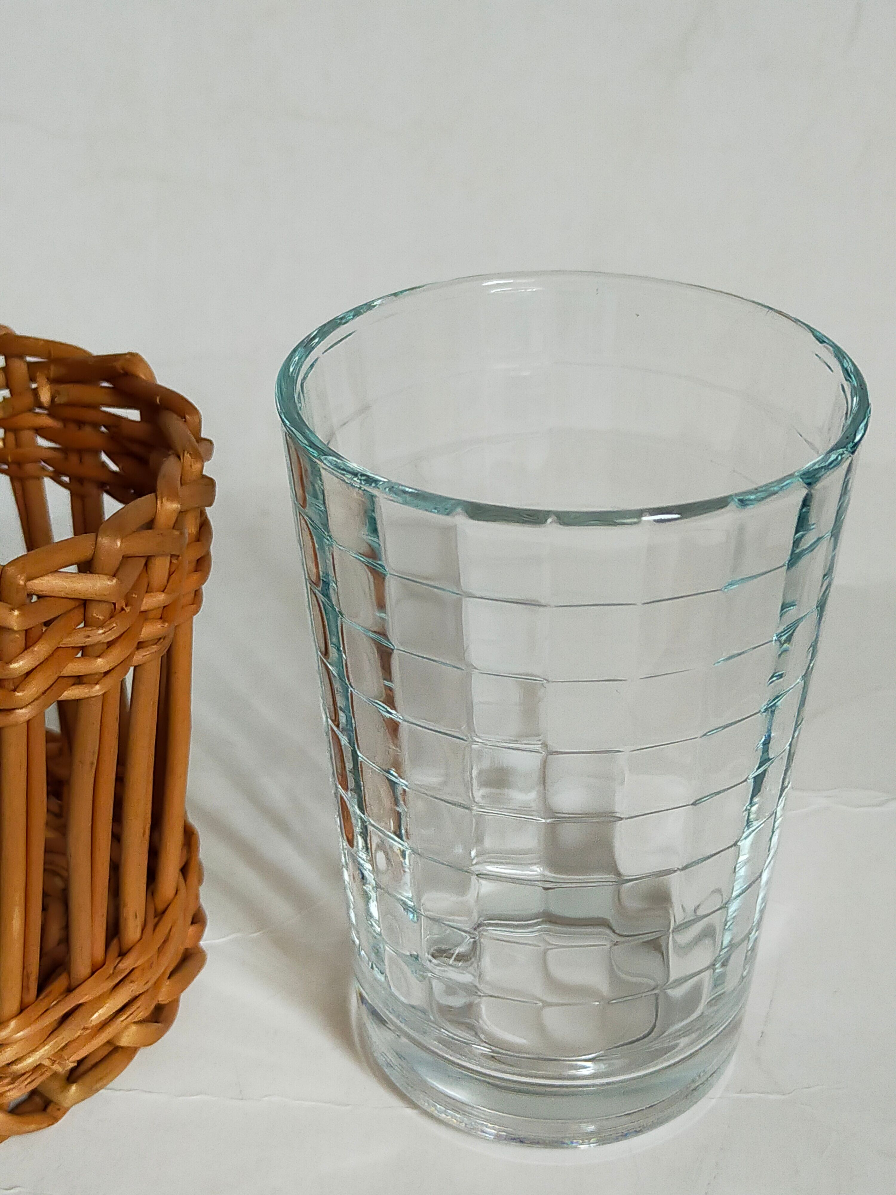 Six vintage 50s glasses in braided rattan cases