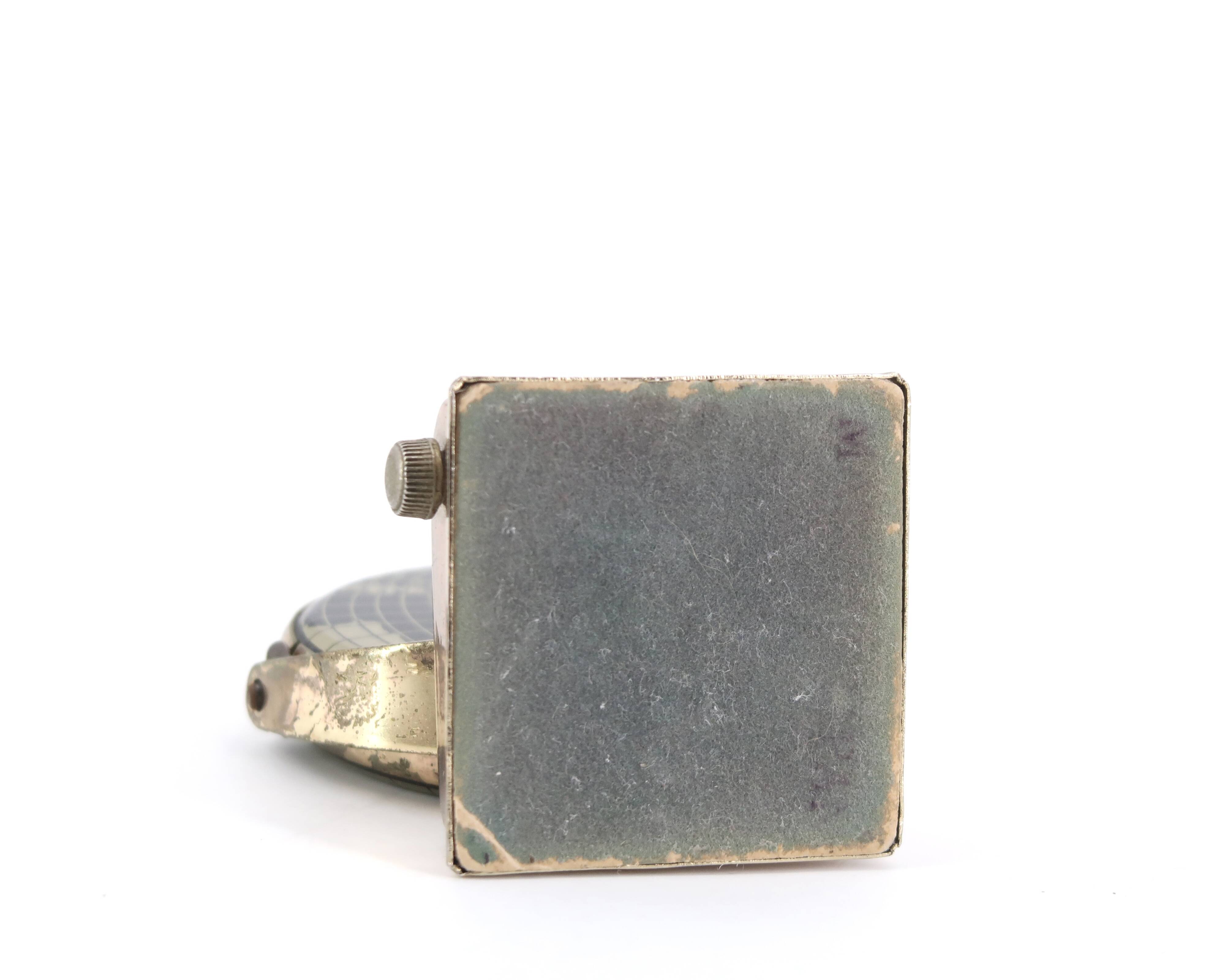 World map perpetual calendar paperweight, 1950s