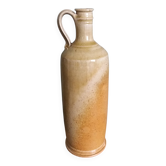 Bouteille à anse, pichet, en grès, signée