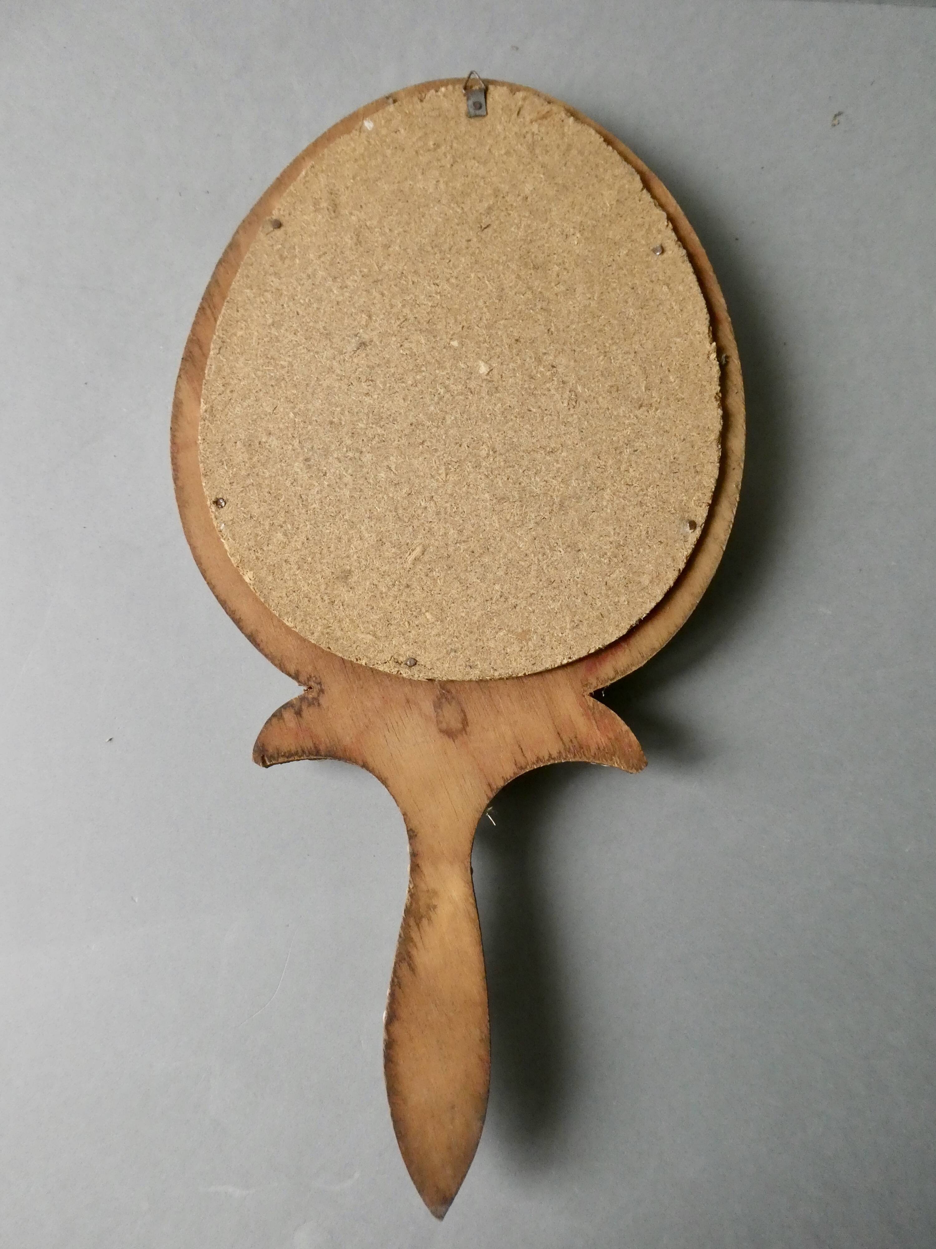 Wall mirror, hand facing in wood and shells