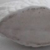 ceramic pot cover in the shape of a swan