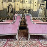 Paire de fauteuils - bergères de style Louis XVI