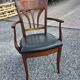 Mid-20th century solid cherry wood office chair.
