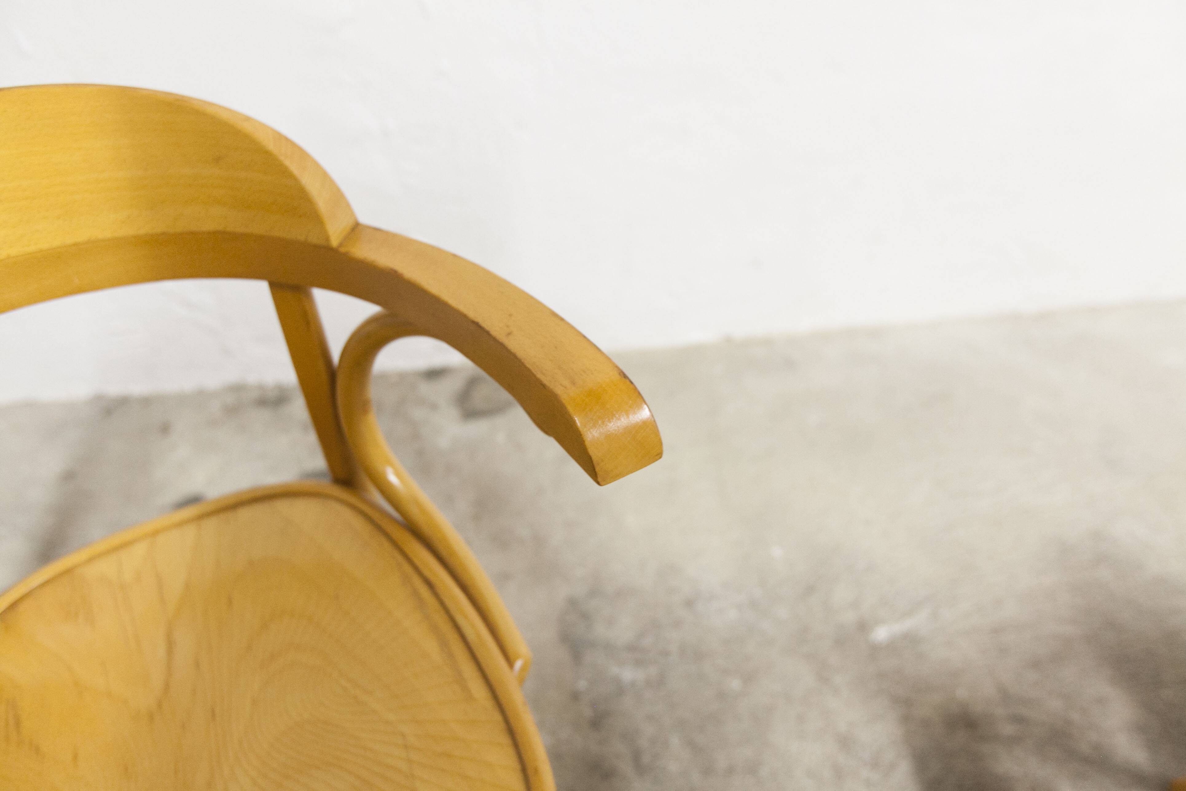 Set of 4 armchair bistro chairs from the 1960s.