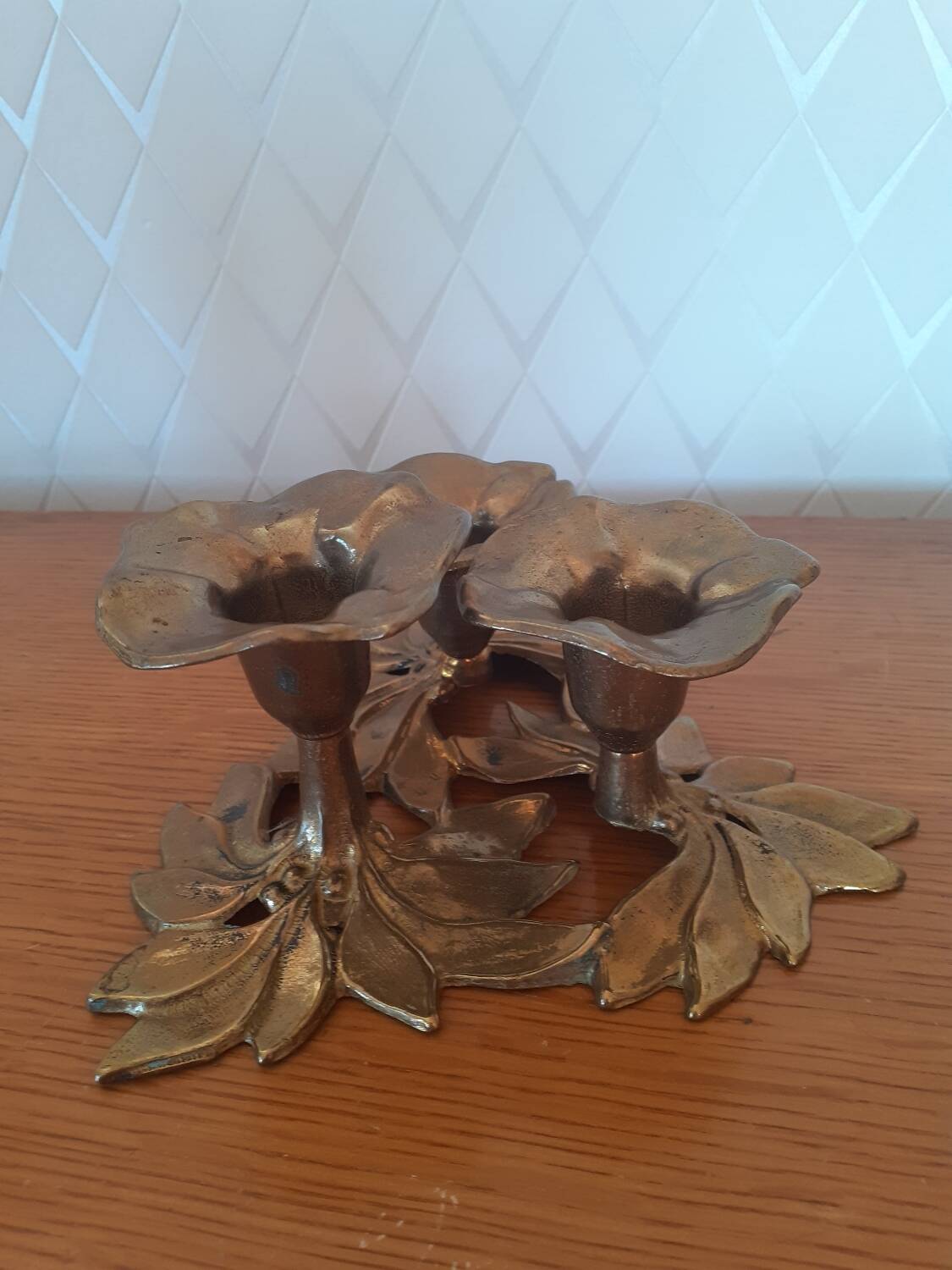 Brass flower candle holder
