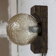 1960s ball wall light in dark wood and amber glass