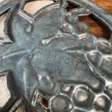 Oval enamelled cast iron trivet