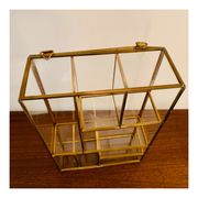 Miniature showcase in glass and gilded metal
