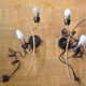 Pair of stylized 2-branch brass wall lights