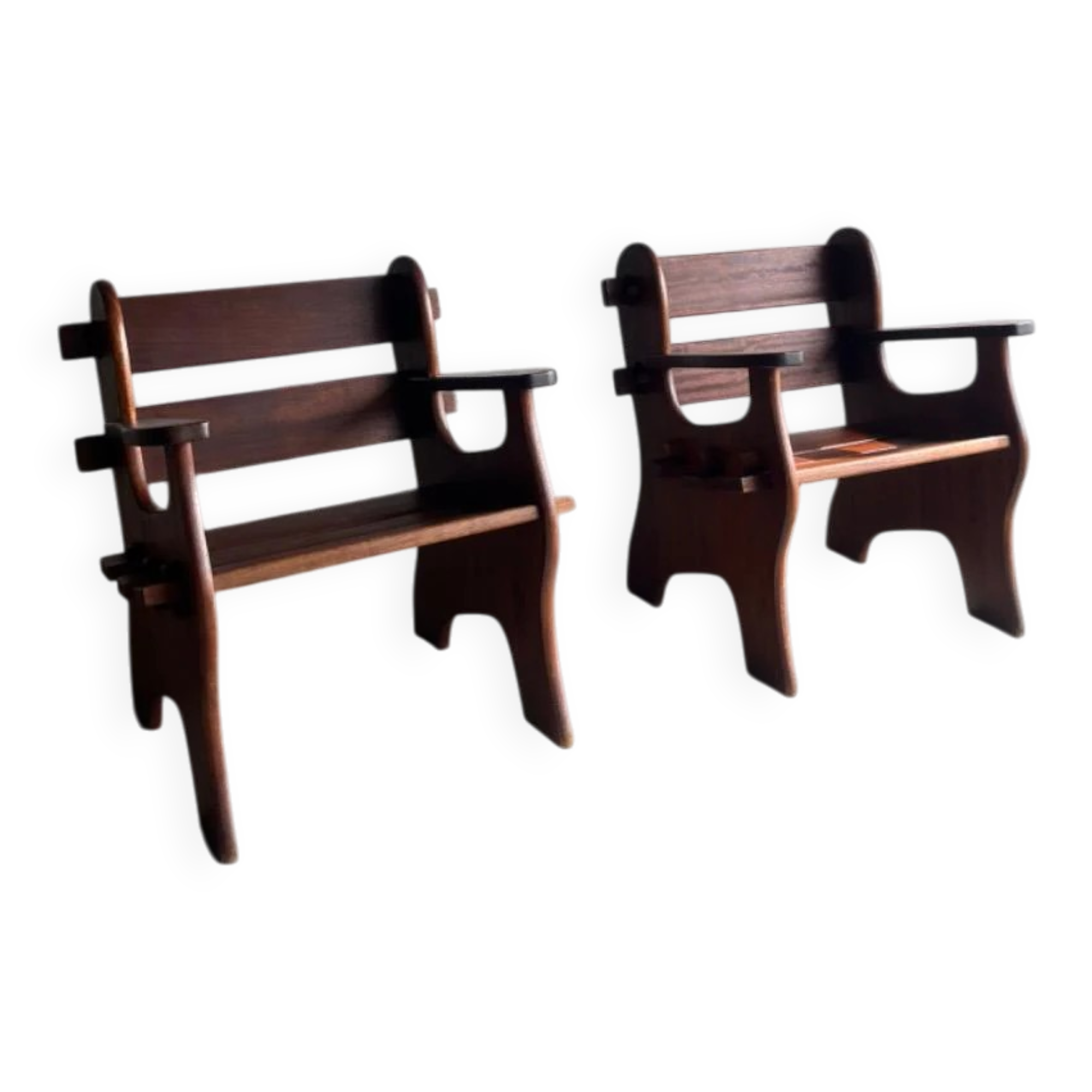 Set of two dark brown solid wood brutalist sculptural chairs with carved details