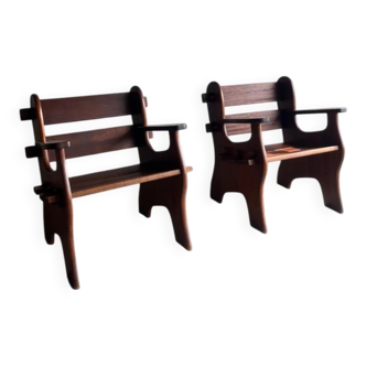 Set of two dark brown solid wood brutalist sculptural chairs with carved details
