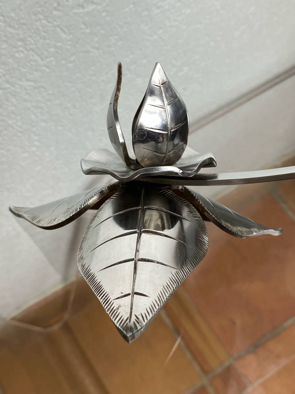 Silver-plated metal flower candle holder