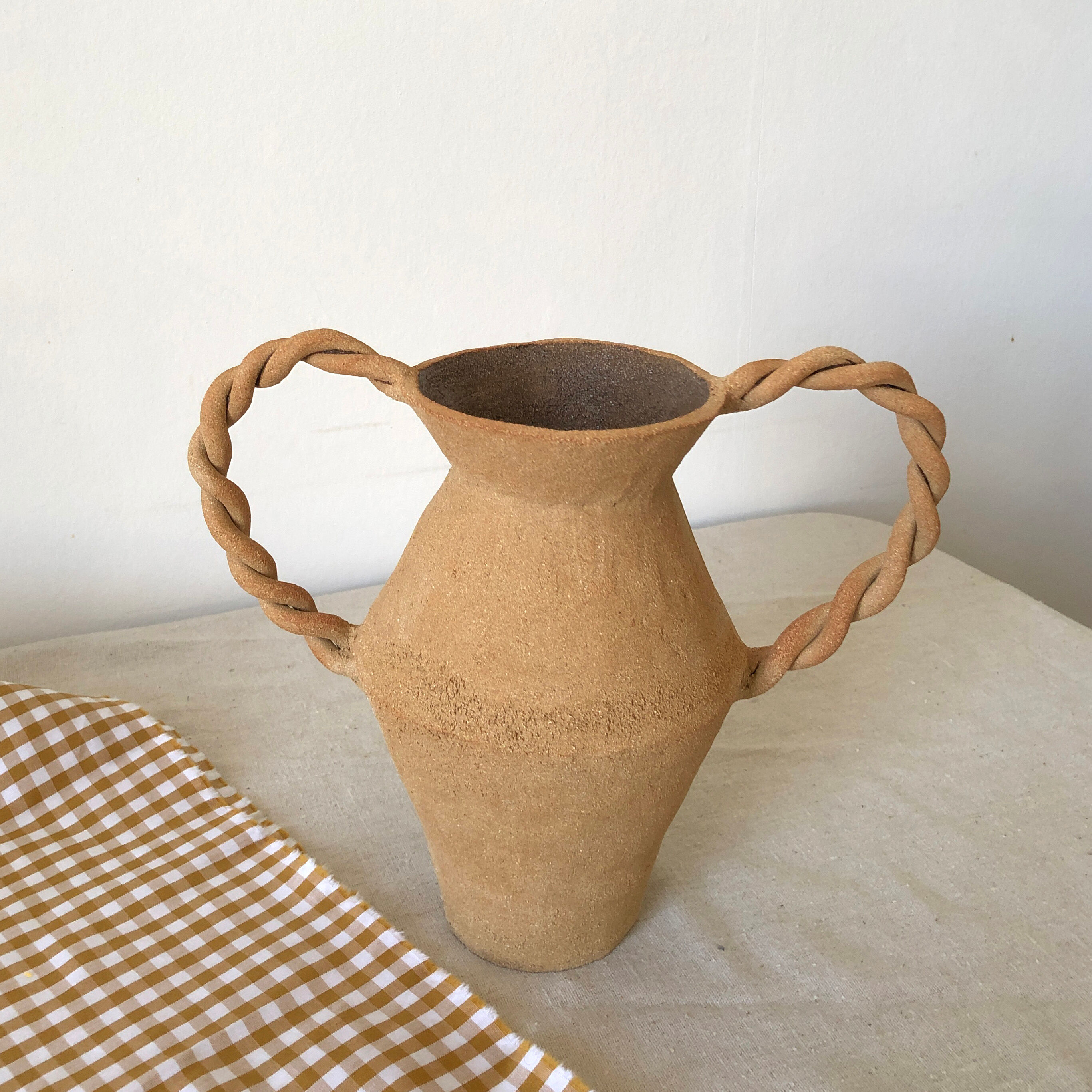 Red sandstone amphora vase