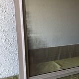 Large patinated wooden mirror with bevelled ice 73x113cm