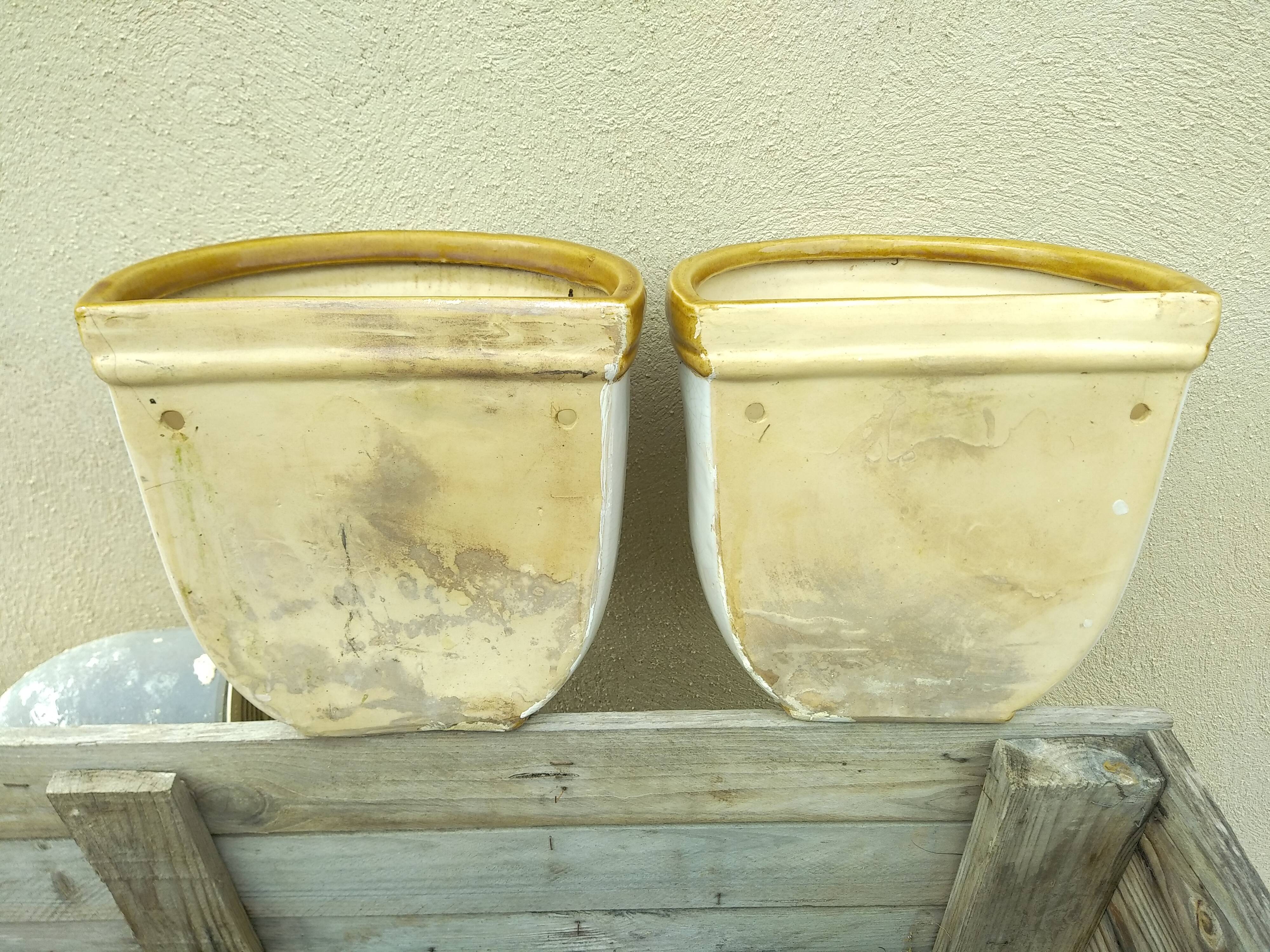Pair of wall-mounted planters/flower pots