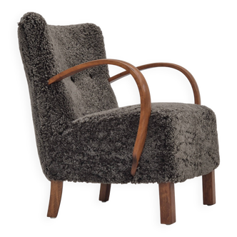 1960s, completely reupholstered Danish art deco armchair, genuine sheepskin "Wellington".