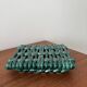 Vintage woven green ceramic trivet from the 70s, handmade.