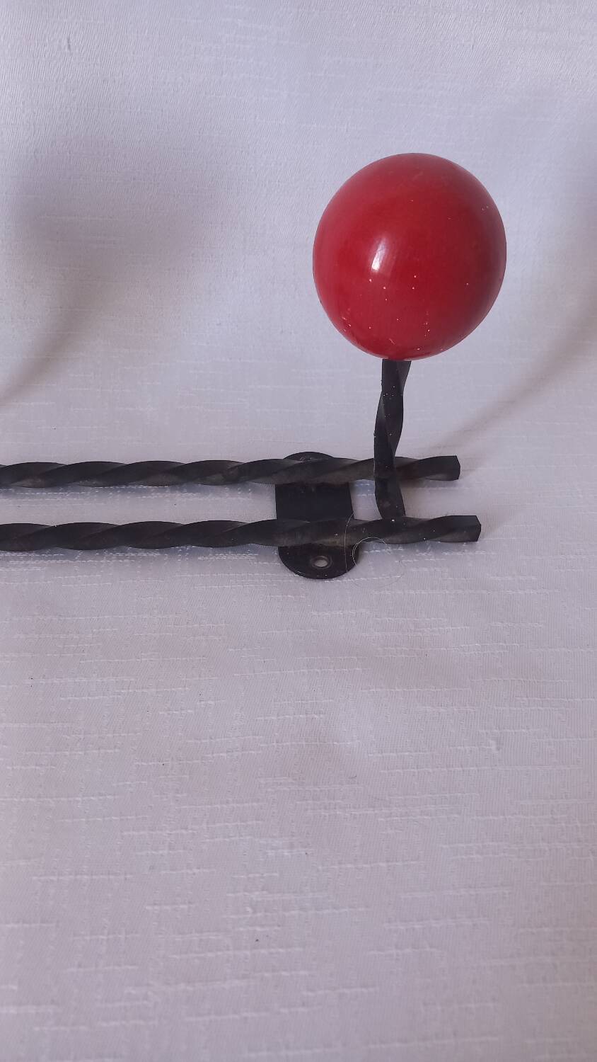 Vintage ball and metal coat racks