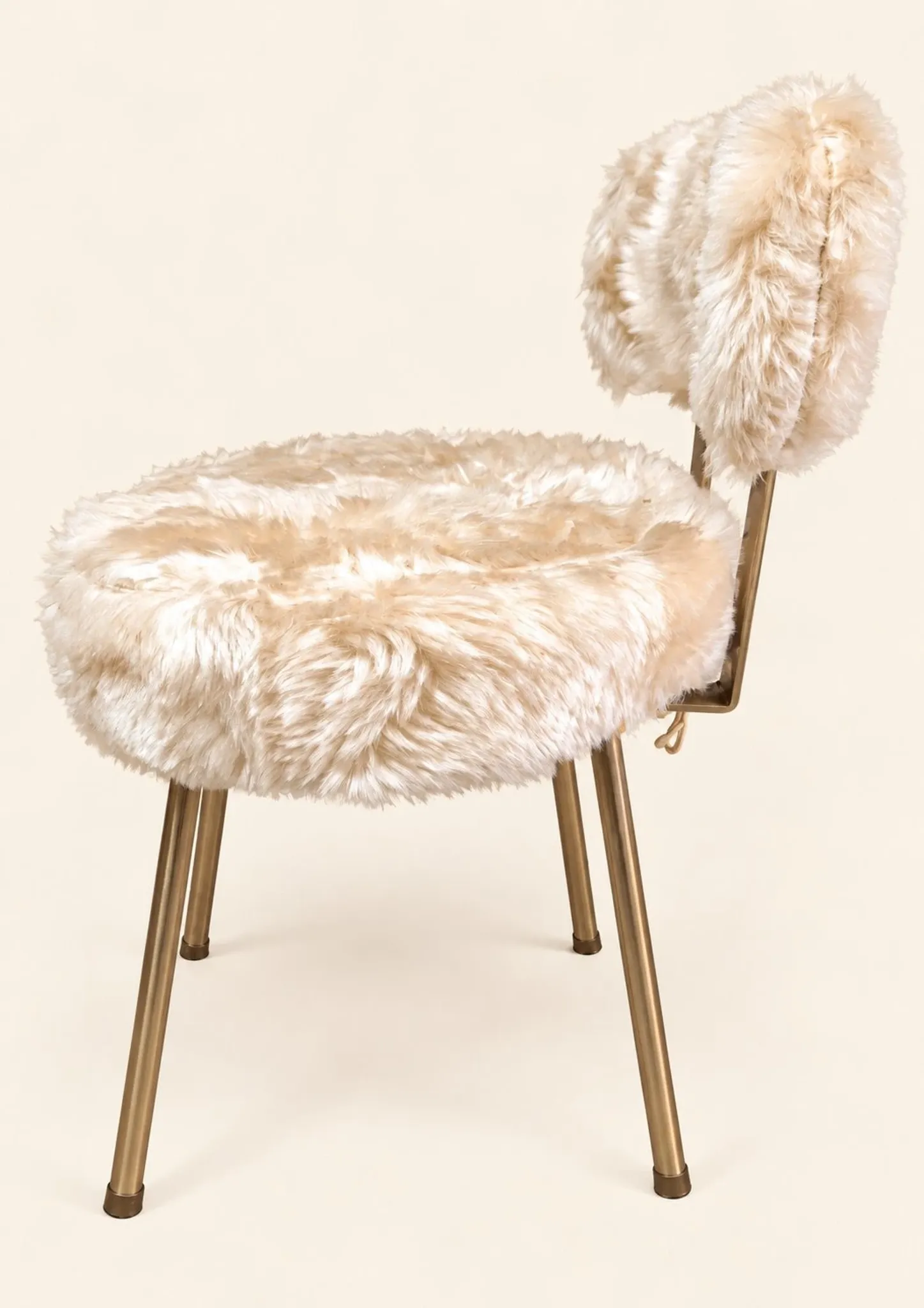 Vintage 1960s dressing table chair with faux fur and golden legs.