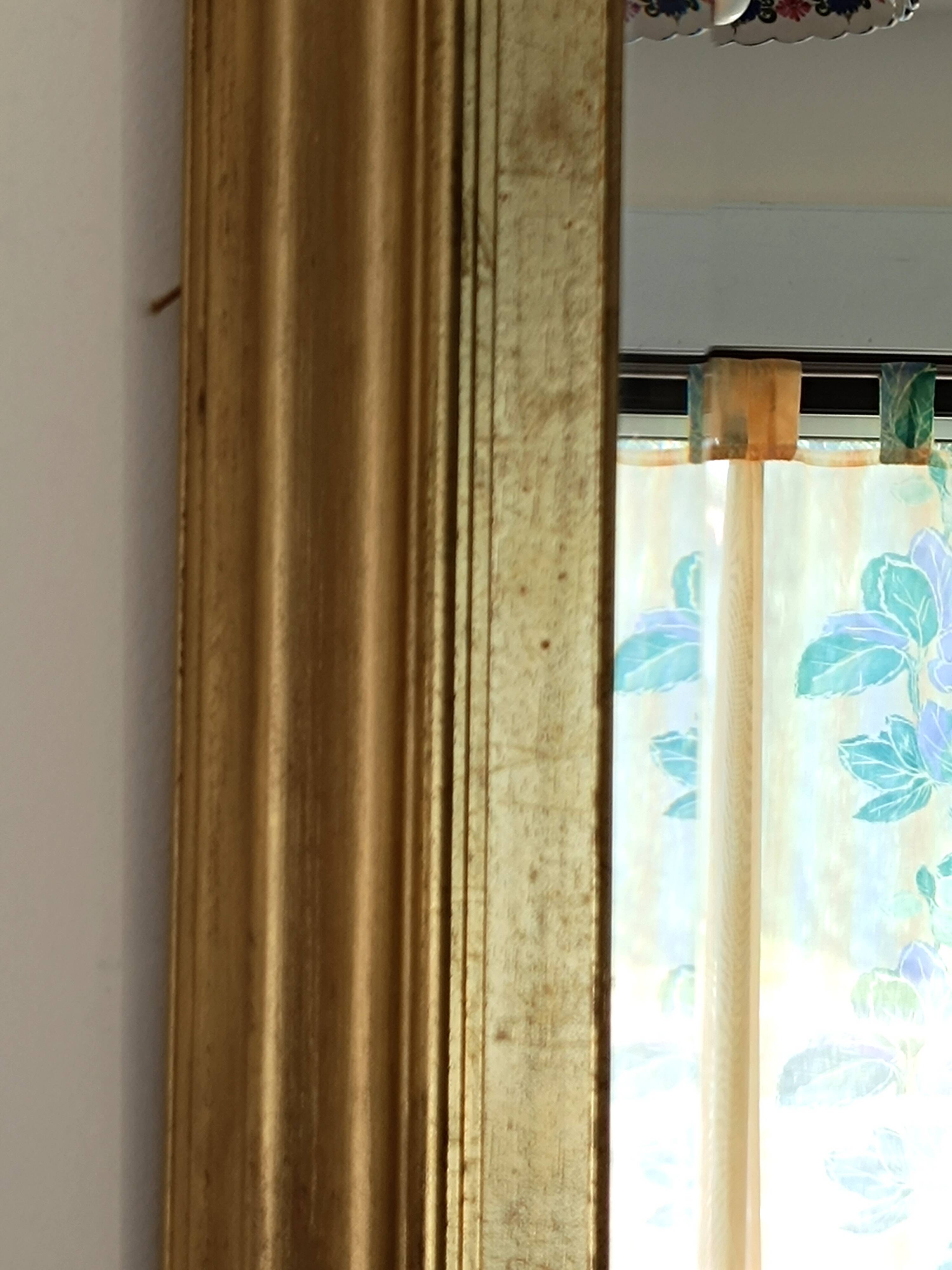 Octagonal gilded wooden mirror