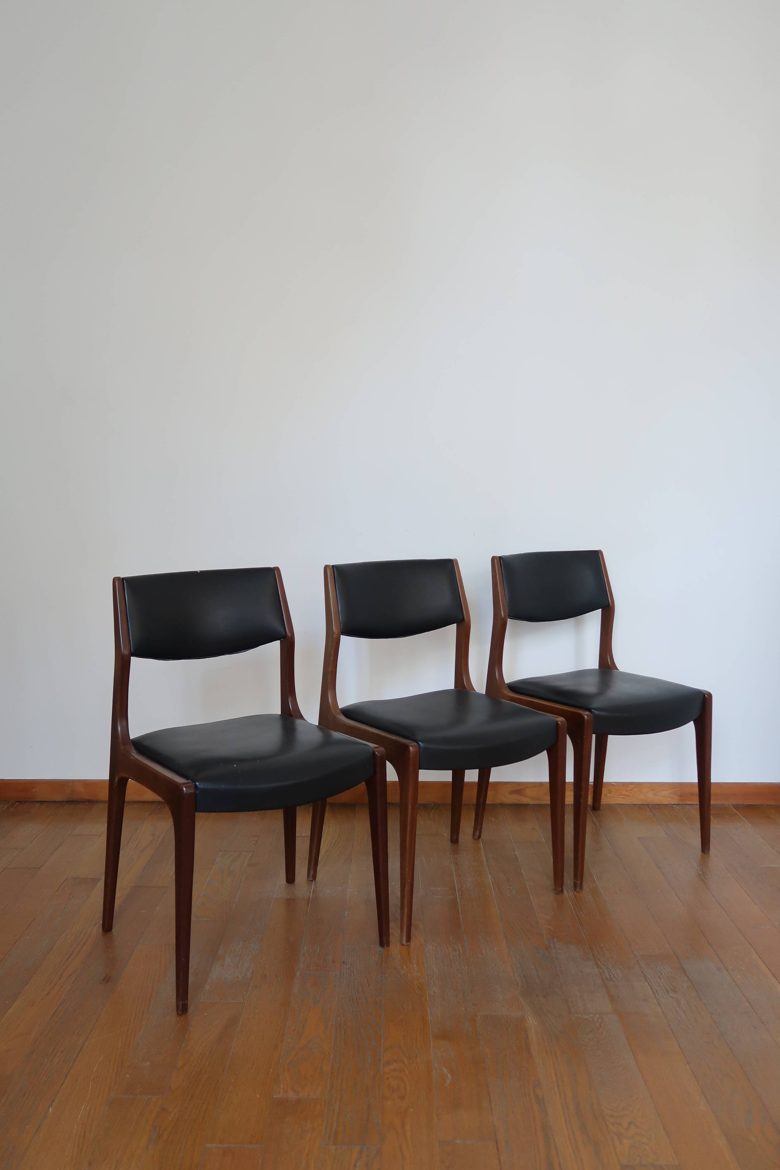 Series of 3 Scandinavian teak and skai chairs