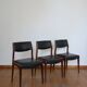 Series of 3 Scandinavian teak and skai chairs