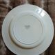 13 mismatched flat plates in ironstone