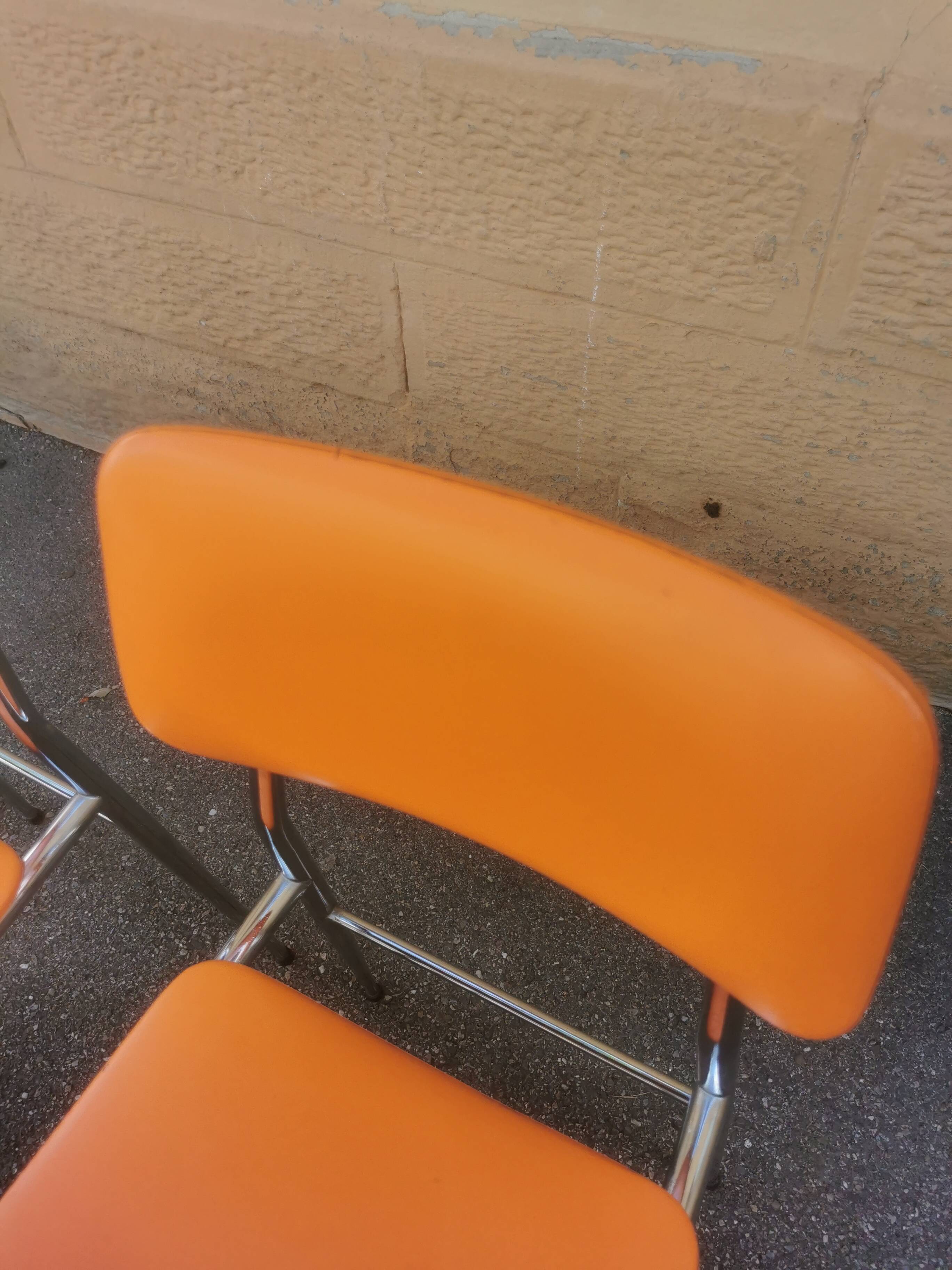 Tubmenager orange vintage chairs
