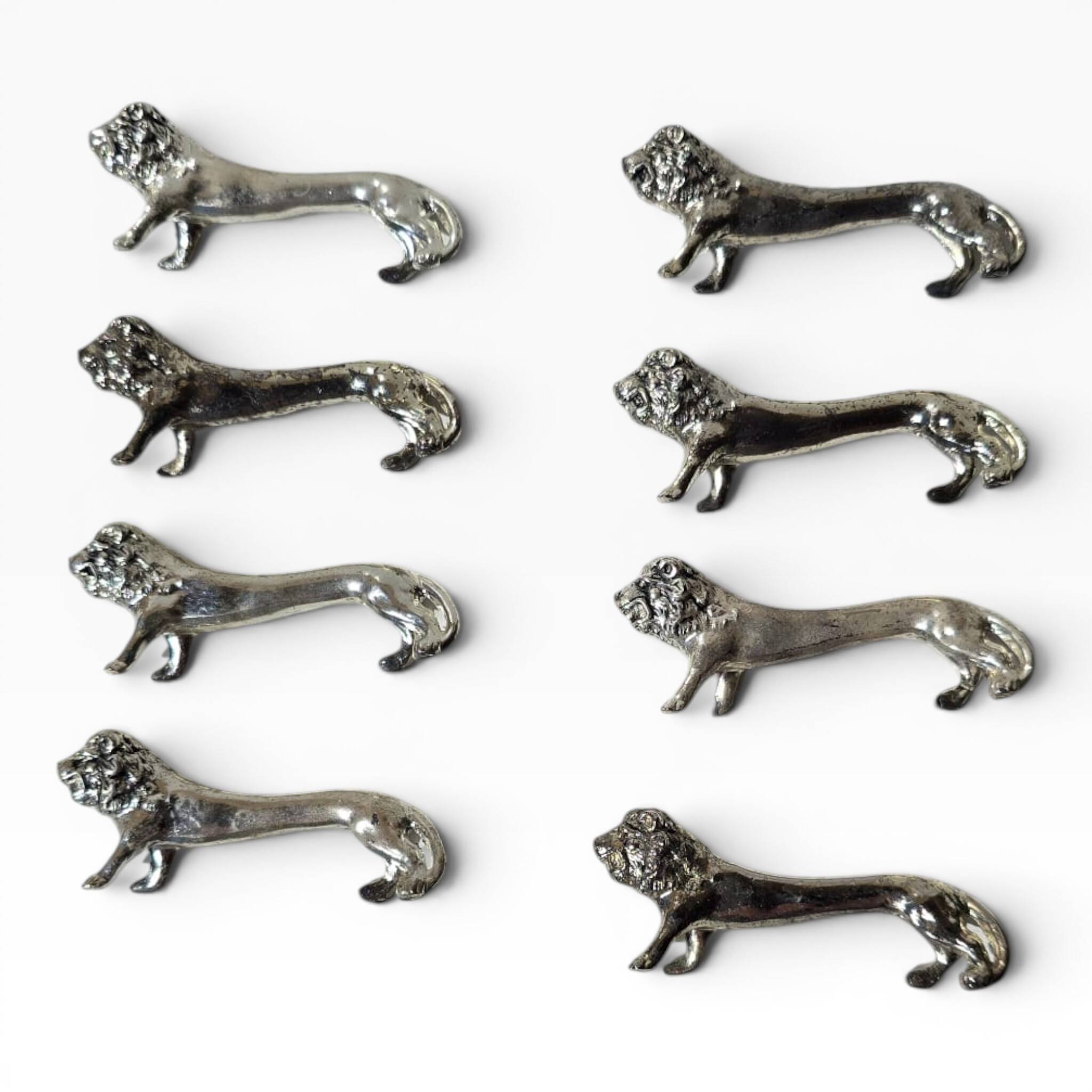 Series of antique knife rests in the shape of a lion, silver-plated metal.