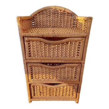 Wicker chest of drawers and rope