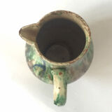 Glazed earth jug