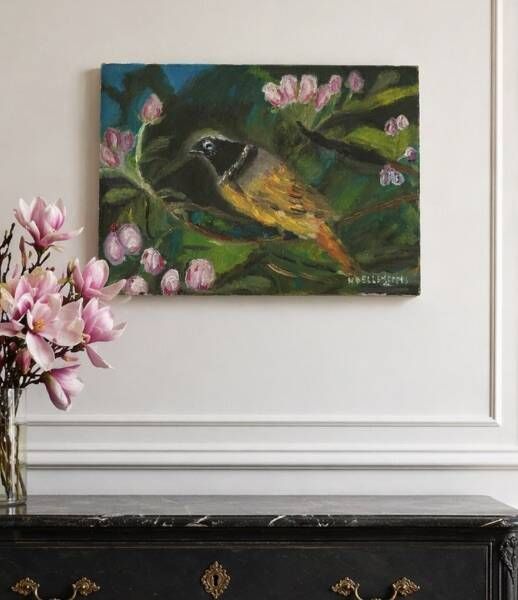 Oil painting still life of a goldfinch.