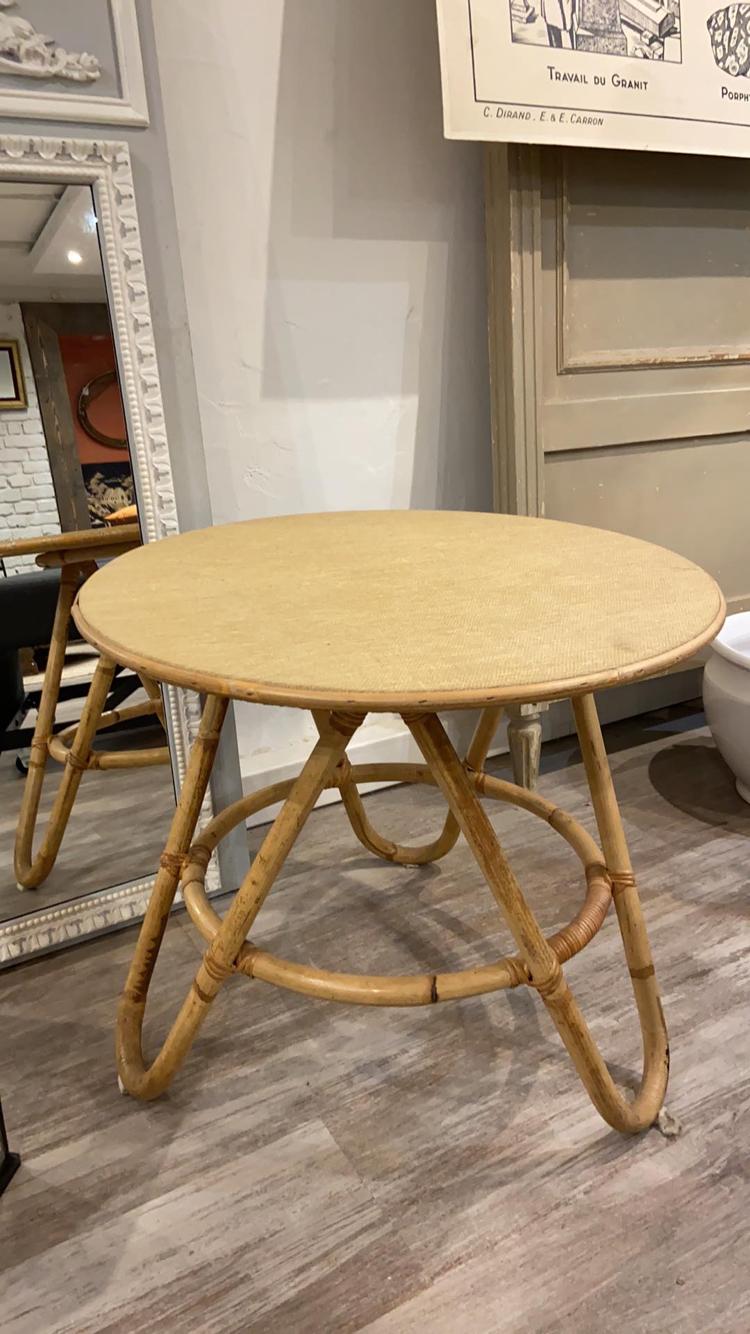 Round coffee table in old rattan
