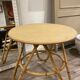 Round coffee table in old rattan