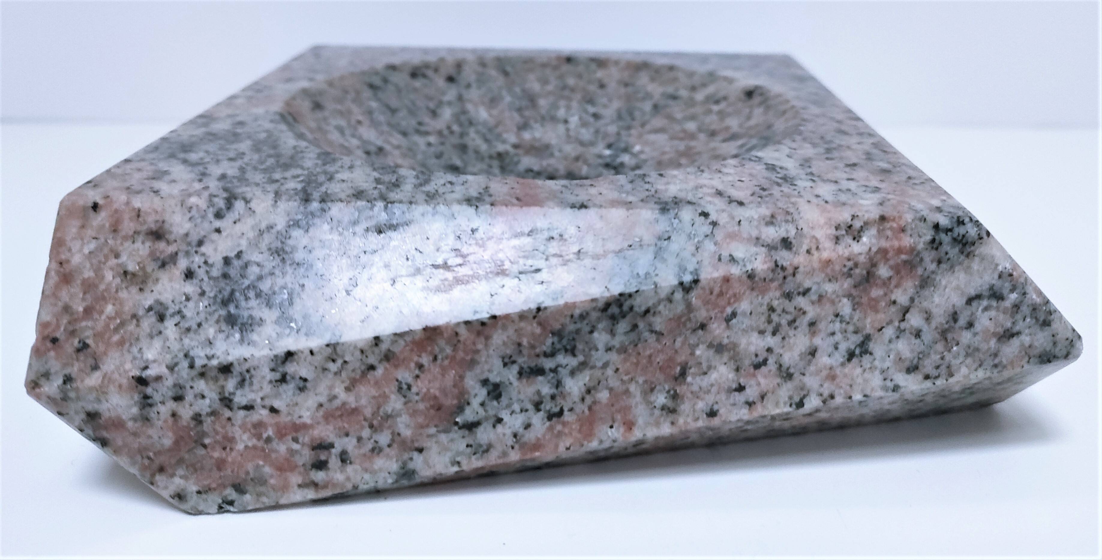 Pink granite pocket emptier from the 80s
